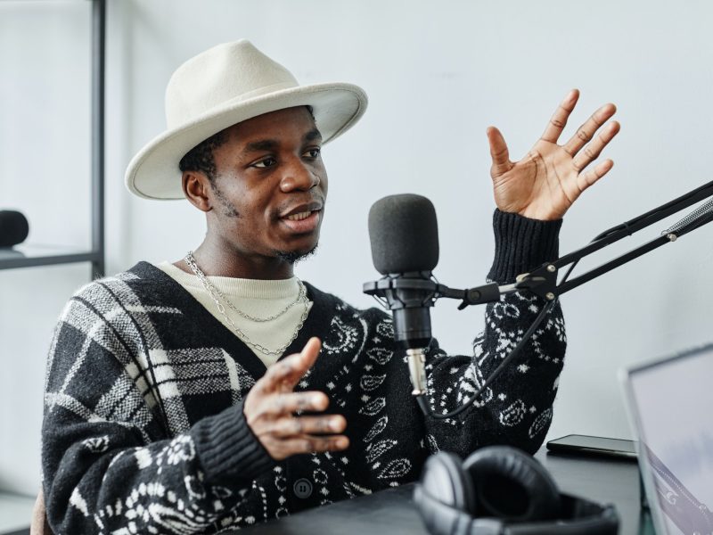 black-creator-speaking-in-podcast.jpg