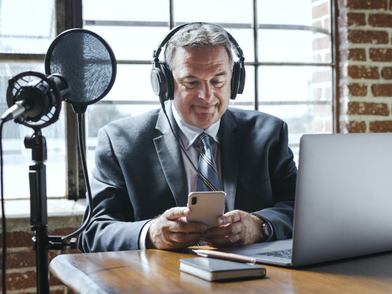 businessman-recording-a-podcast.jpg