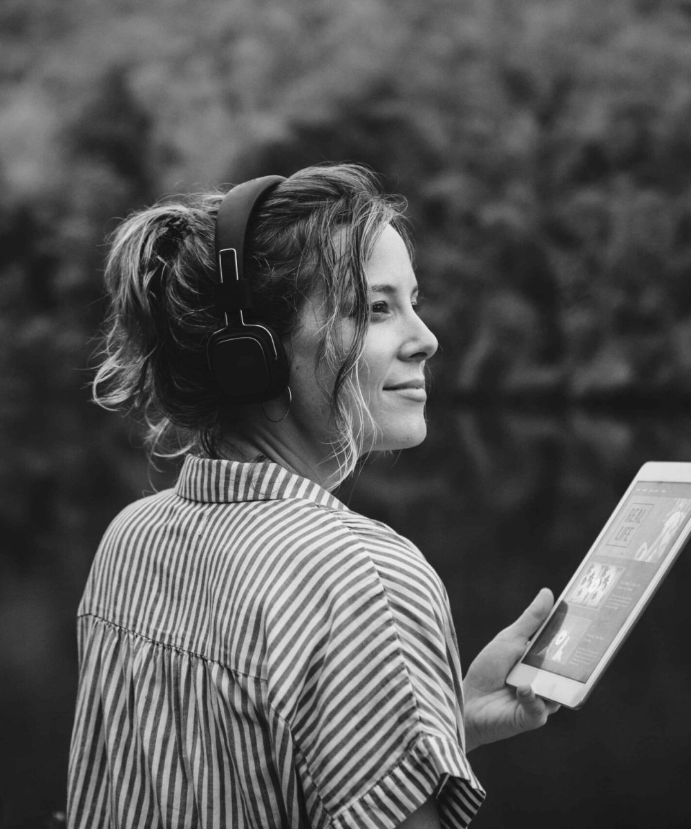woman-alone-nature-listening-music-with-headphones-dig-min